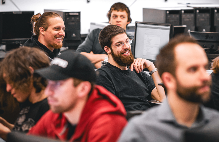 People working on computer servers