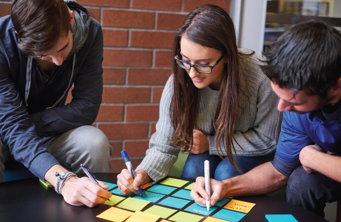 Student Studying post it notes