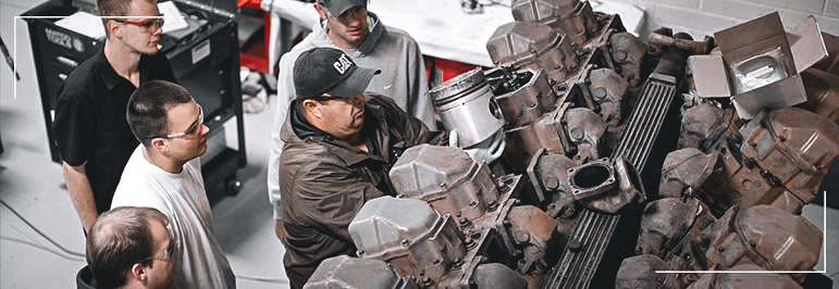 Student working on diesel rig