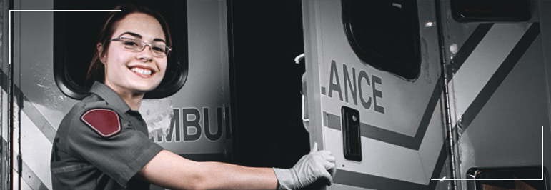 Student performing CPR on training dummy